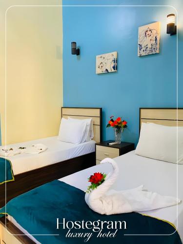 Cama o camas de una habitación en Host Hotel