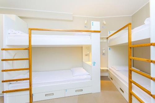 a room with bunk beds in a hostel at Hostel Dvor in Split