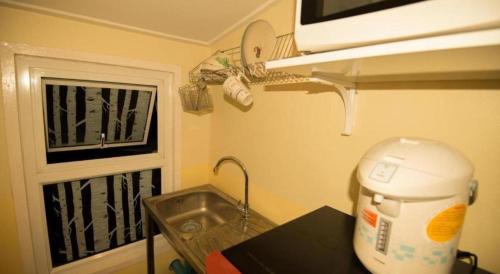 Η κουζίνα ή μικρή κουζίνα στο De hostel