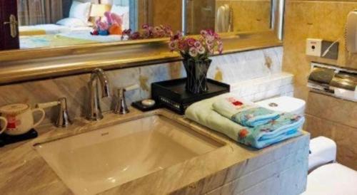 Koupelna v ubytování Taishan Bojue Hotel