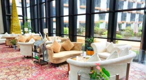 Χώρος καθιστικού στο Huangshan Xuanyuan International Hotel