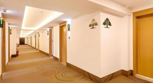 a corridor of a hospital with at GreenTree Inn Jinzhong PinGYAo City South Railway Station Express Hotel in Pingyao