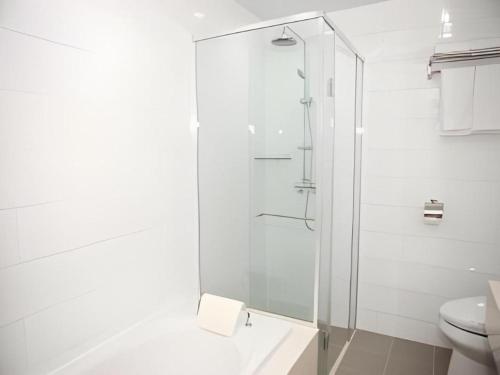 Koupelna v ubytování Richell Hotel