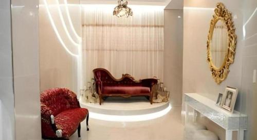 Posezení v ubytování Richell Hotel