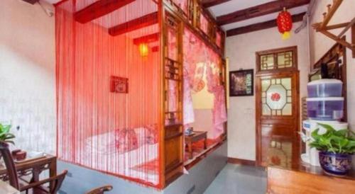 Cama o camas de una habitación en Pingyao Yufengheng Hotel