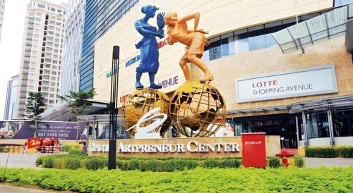 a statue in front of a building at An Hotel Jakarta in Jakarta
