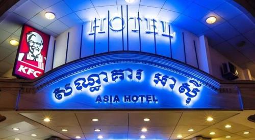 a sign for an asian house in a building at Asia Hotel in Phnom Penh