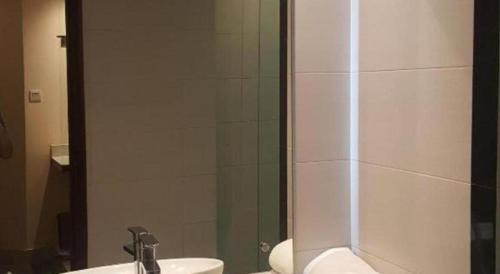 Ванная комната в Kharisma Hotel