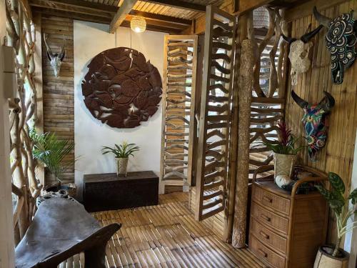 a room with wooden walls and a wooden floor at Balay Asiano in Puerto Princesa City