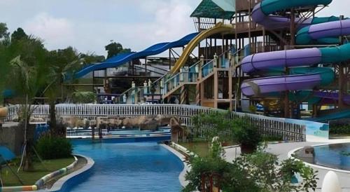a water slide at a water park at Labersa Grand Hotel &Convention Center in Pekanbaru