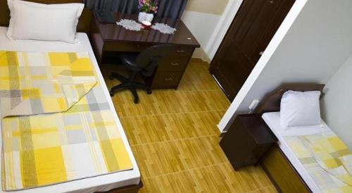 Кровать или кровати в номере Spring Hotel
