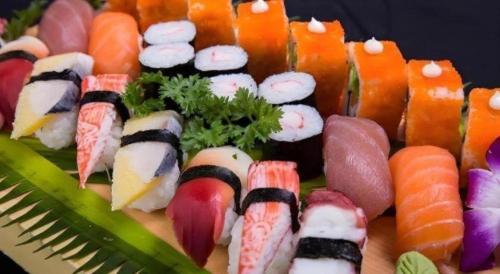 a plate of sushi with different types of vegetables at Green Hotel Da Nang in Da Nang