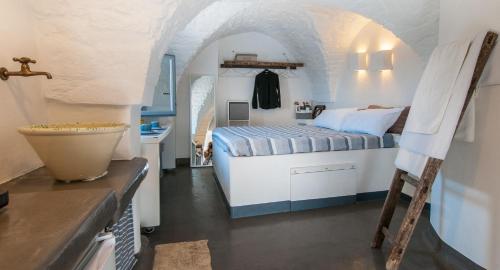 Säng eller sängar i ett rum på I 7 Archi Guest House