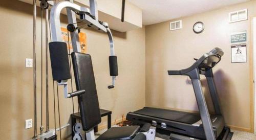 a fitness room with a treadmill and a gym at Quality Inn in Edgerton