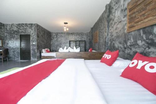 Cama o camas de una habitación en OYO 75374 Baan Rak Mai