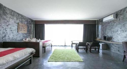Cama o camas de una habitación en OYO 75374 Baan Rak Mai