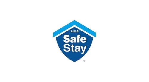 a blue sales sign with the words sale stay at Best Western Plus Twin View Inn and Suites in Redding