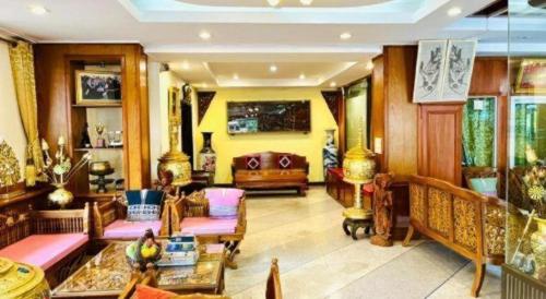 Posezení v ubytování Ngamta Hotel