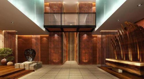 a lobby with a bench and a glass ceiling at AOLUGUYA in Harbin