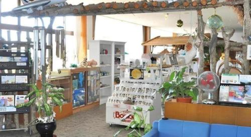 a store with plants and other items on display at Hotel Thida No Sato in Miyako Island
