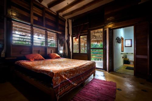Ένα ή περισσότερα κρεβάτια σε δωμάτιο στο Casa Cereza