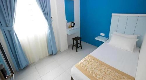 Katil atau katil-katil dalam bilik di Skyview Hotel
