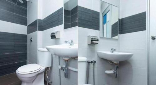 Ванная комната в Hotel Aromas Kulai