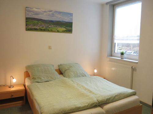 Voodi või voodid majutusasutuse Holiday home in the centre of Willingen with view toas