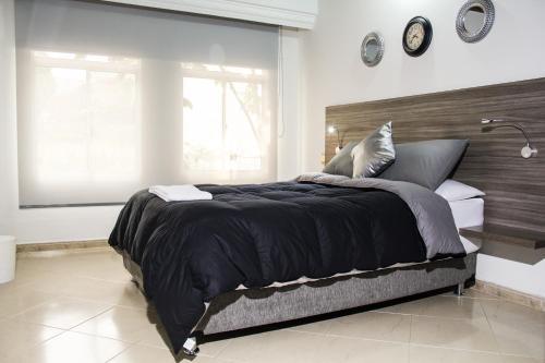 Ένα ή περισσότερα κρεβάτια σε δωμάτιο στο Hotel PREMIUM HOUSE