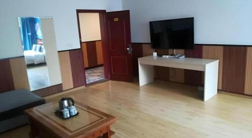 Η κουζίνα ή μικρή κουζίνα στο PAI Hotels·Zigong Rong County Dafosi South Bus Station