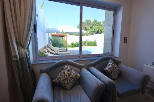 Χώρος καθιστικού στο Almansi luxury retreat 1