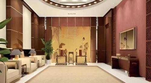 a lobby with a living room with a large window at Ramada by Wyndham Zibo in Zibo