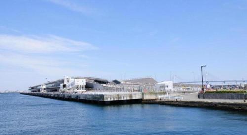 a dock in the middle of a body of water at Hotel Edit Yokohama in Yokohama