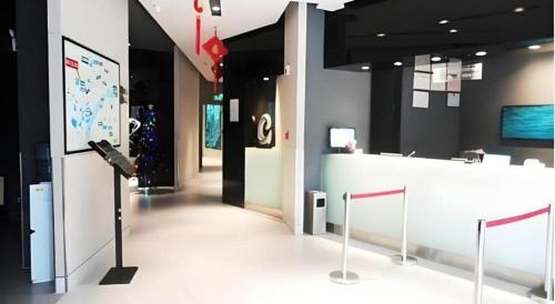 a room with a white counter in a building at Jinjiang Inn Luoyang Wangcheng Park Metro Station in Luoyang