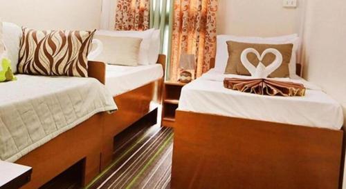 Letto o letti in una camera di AEROSTOP HOTEL & RESTAURANT