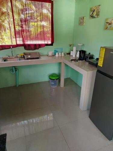 Cuisine ou kitchenette dans l'établissement Mata palo bech club