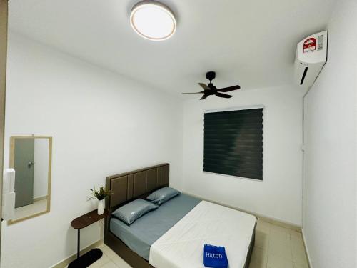 Ένα ή περισσότερα κρεβάτια σε δωμάτιο στο De FiveOne Stay - Seri Serindit