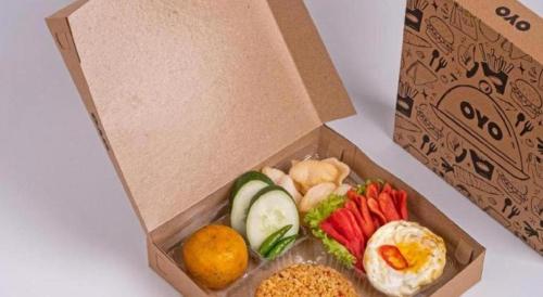 a box filled with different types of fruits and vegetables at Hotel O Homestay Simpang Panji Suroso Syariah in Malang