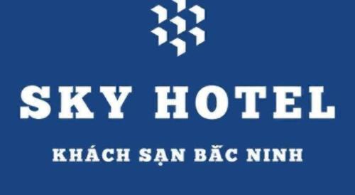 a sign that says sky hotel and a black san bag mine at SKY HOTEL - KHÁCH SẠN BẮC NINH in Bắc Ninh