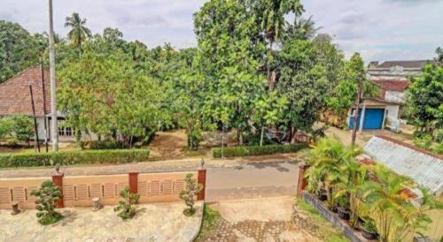 an aerial view of a park with a skateboard ramp at OYO 90945 Arizon Kost in Jambi