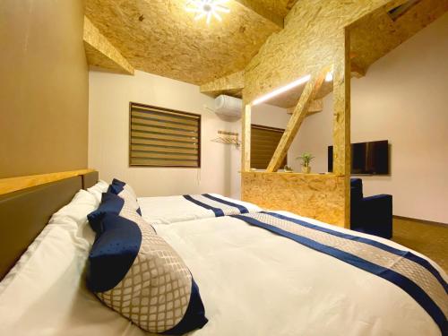 Ένα ή περισσότερα κρεβάτια σε δωμάτιο στο Diamond Yu - Vacation STAY 28695v