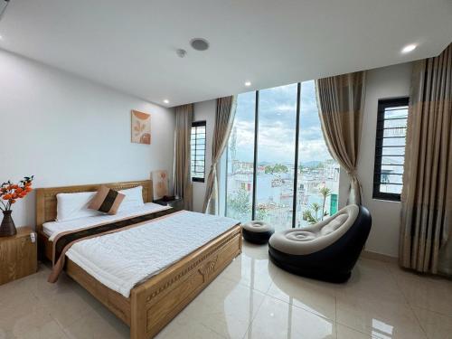 Ένα ή περισσότερα κρεβάτια σε δωμάτιο στο Ruby Star Hotel - Apartment Biển Vũng Tàu