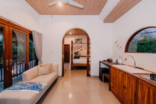 Кровать или кровати в номере 28 Degrees Lembongan