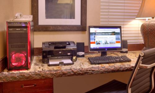a desk with a computer and a printer on it at Holiday Inn Express & Suites Kanab by IHG in Kanab