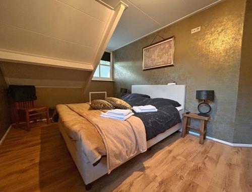 Postel nebo postele na pokoji v ubytování B&B Erve Möskert