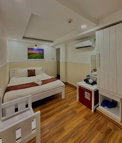 Ein Bett oder Betten in einem Zimmer der Unterkunft Hotel Minh Hang