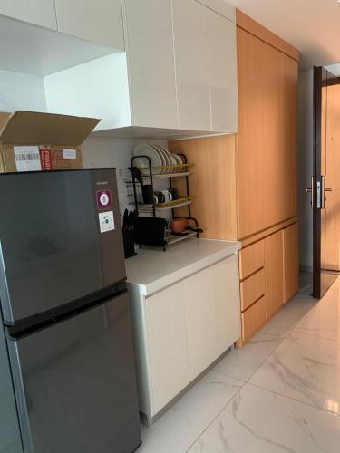 Kuchyň nebo kuchyňský kout v ubytování Sky House BSD Apartment - 3 Bedroom Type