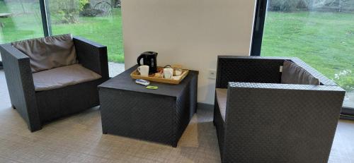 Χώρος καθιστικού στο Villa Maëlla en Normandie- chambres tout confort - SPA