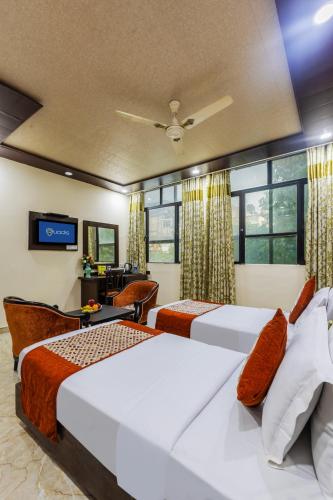 Postel nebo postele na pokoji v ubytování Hotel Amar Inn- Lajpat Nagar Central Market
