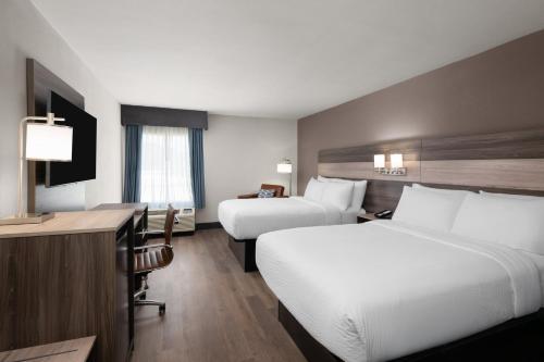 Ένα ή περισσότερα κρεβάτια σε δωμάτιο στο Garner Hotel Augusta West by IHG